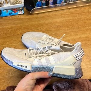 These a lightly worn pair of Adidas NMD. Only worn a few times